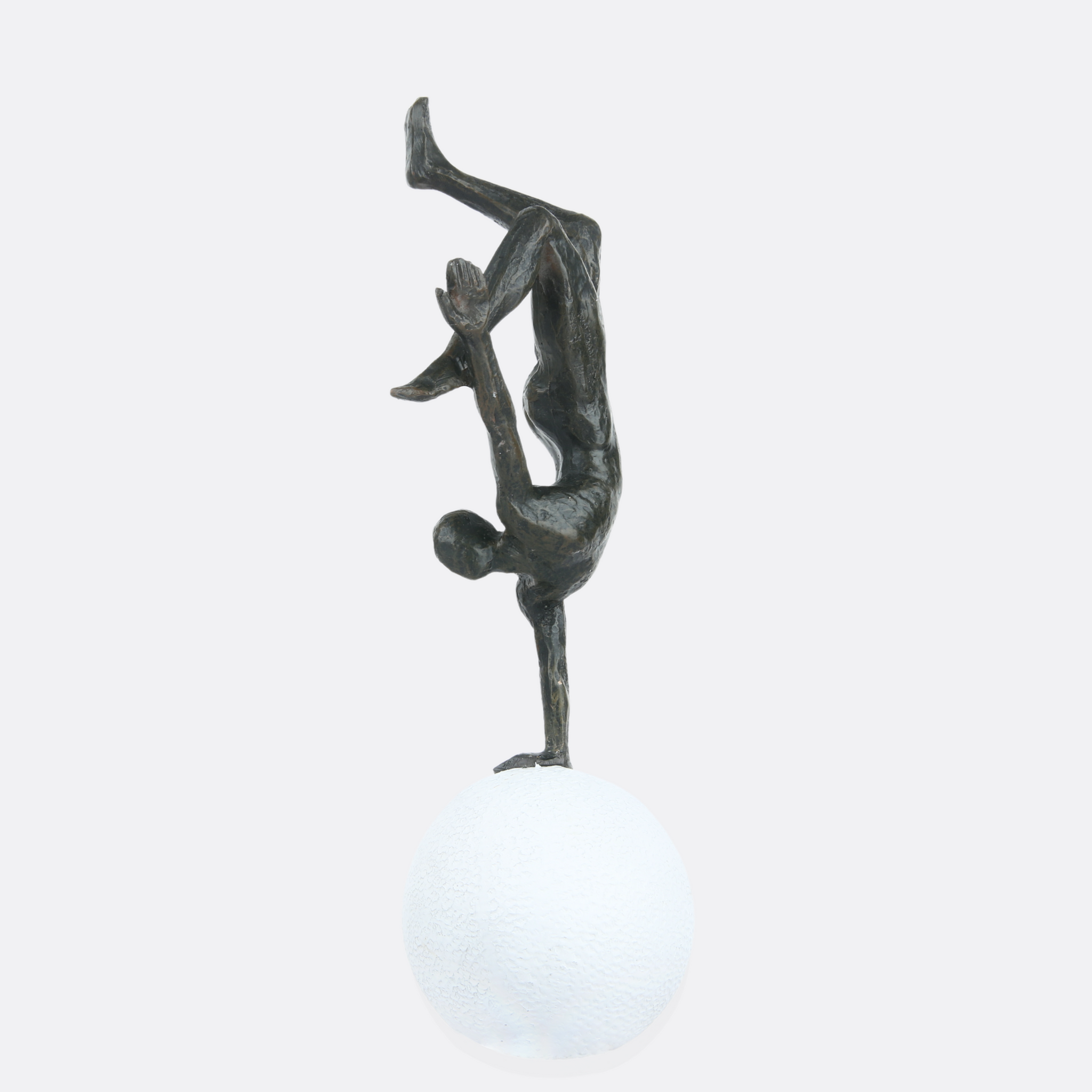 Acrobatic Man On White Ball