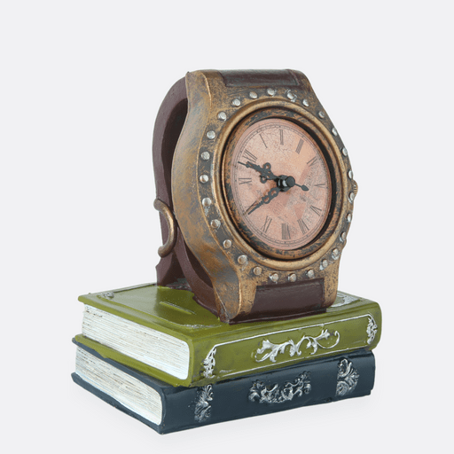 Decorative wrist watch on books